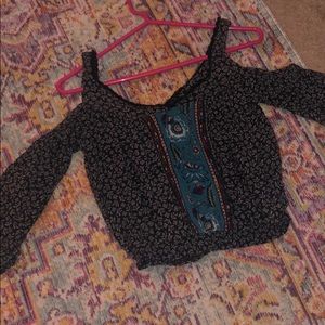 Cropped shoulder less shirt